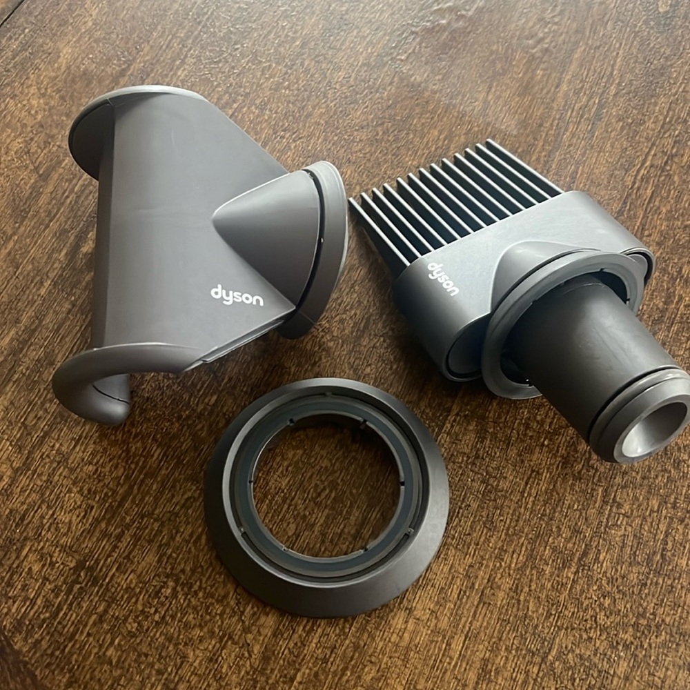 Hair dryer attachments for Dyson blow dryer.